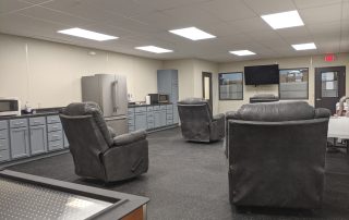 In-Plant Employee Breakroom In-Plant Employee Breakroom with multiple recliners and a tv