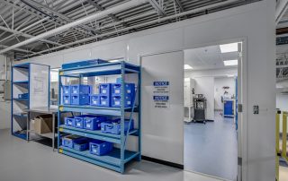 In-Plant Lab In-Plant Lab with blue shelving and boxes outside