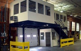 Mezzanine Offices Above Receiving Door White Mezzanine Offices Above Receiving Door with yellow guardrails